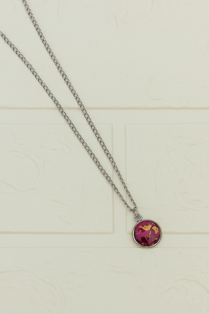 Elegant Round Pendant with Red & Gold Flakes